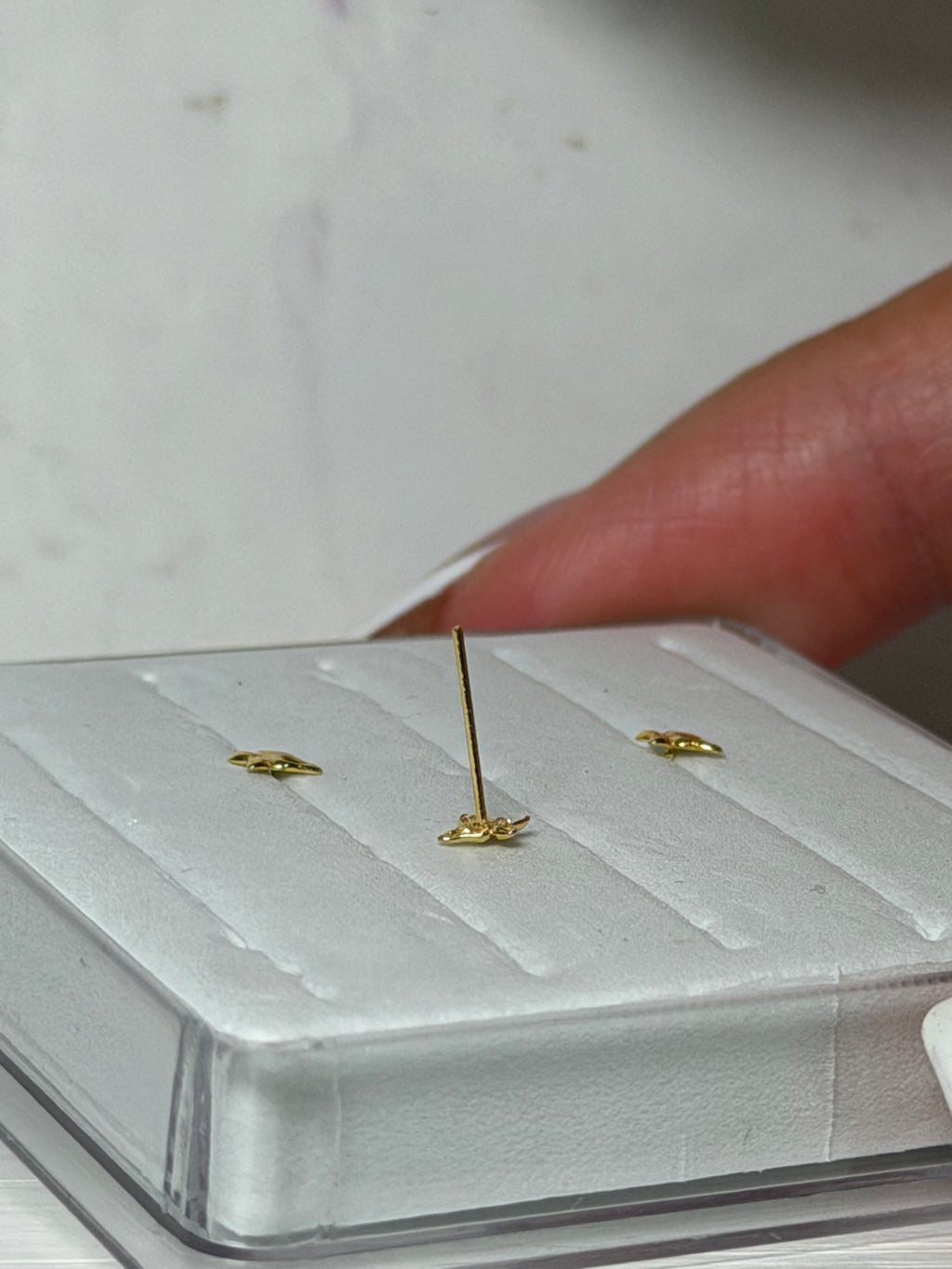 Goldie Butterfly Nose Piercing