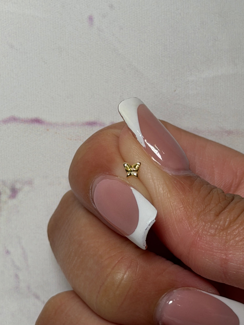 Goldie Butterfly Nose Piercing