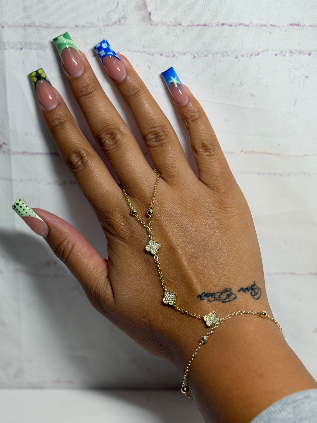 Gold clover hand chain bracelet