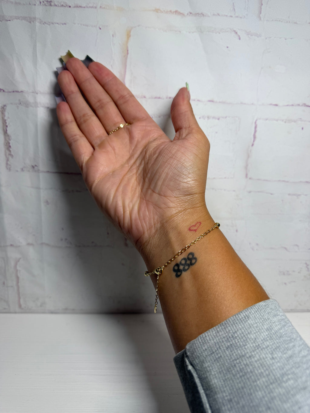 Gold clover hand chain bracelet